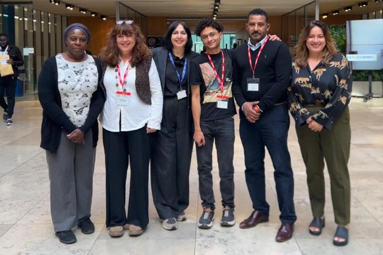 6 people stood side-by-side in atrium of Tooley Street
