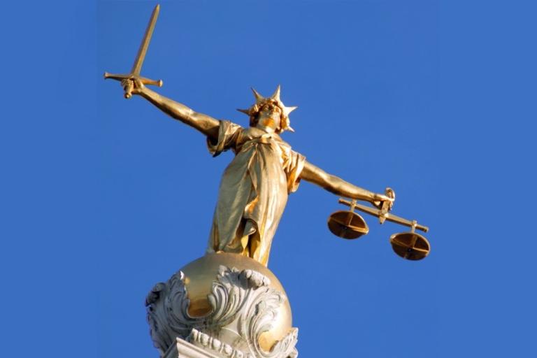 Decorate image showing the Statue of Justice 