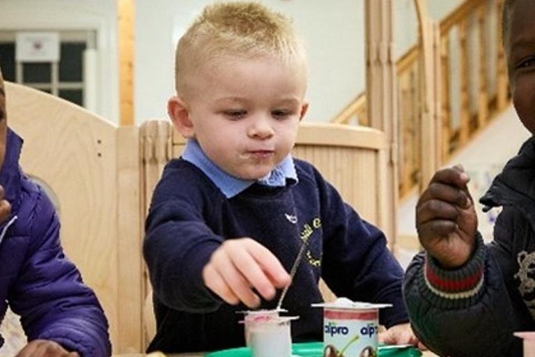 Children enjoying a healthy breakfast