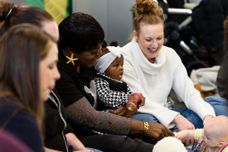 Mum singing with babies
