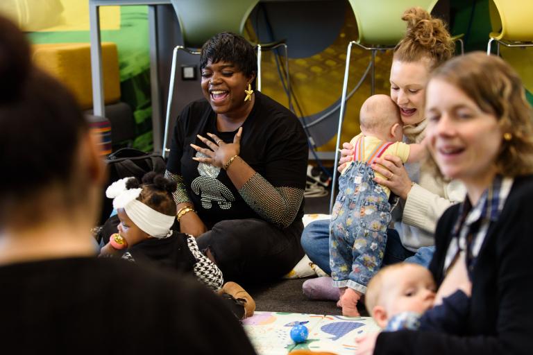 Mum singing with babies