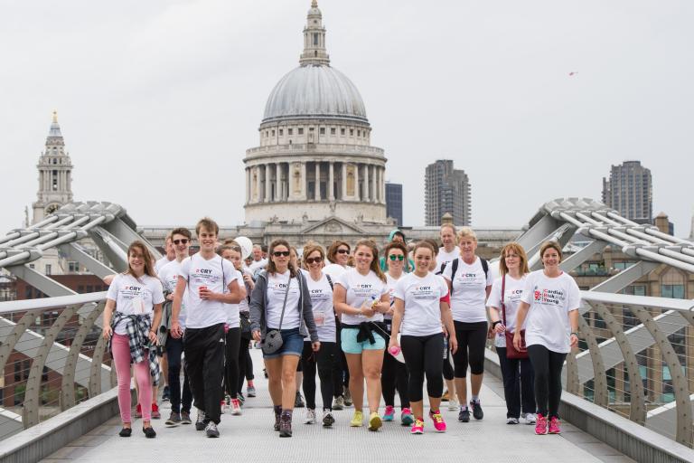 CRY supporters walking across the Millennium Bridge