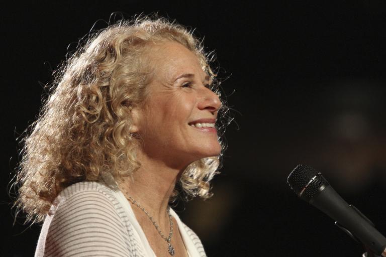 A smiling image of Carole King