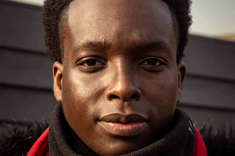 A close shot of that face of a young black male