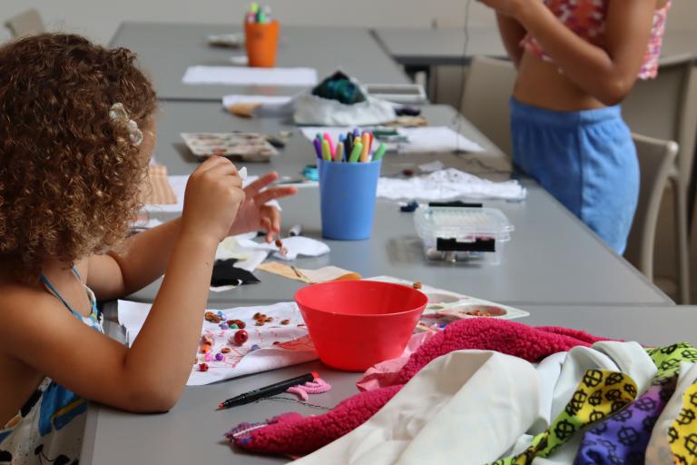 A child takes part in free drawing activities at the South London Gallery