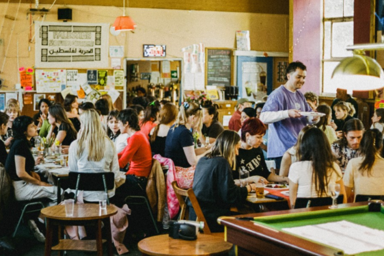 Lively and crowded group chatting and eating at SET Social