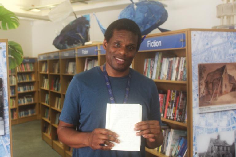Man holding poem