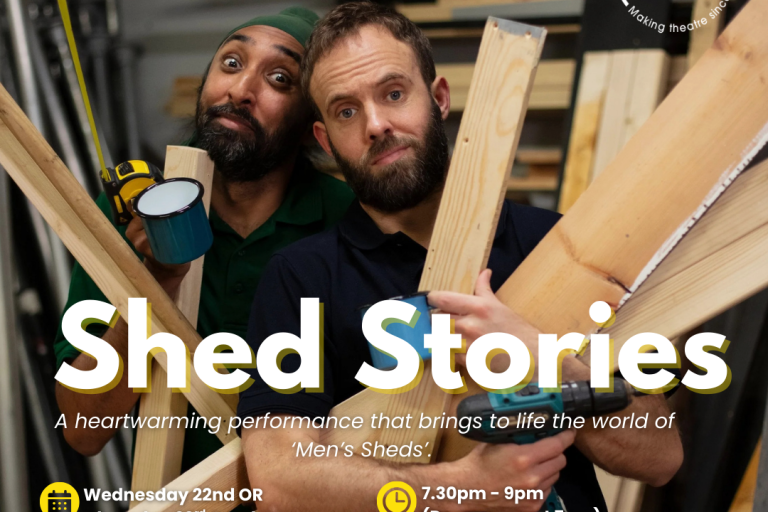 Two men hold stack of wood in their arms, as if to start a DIY project