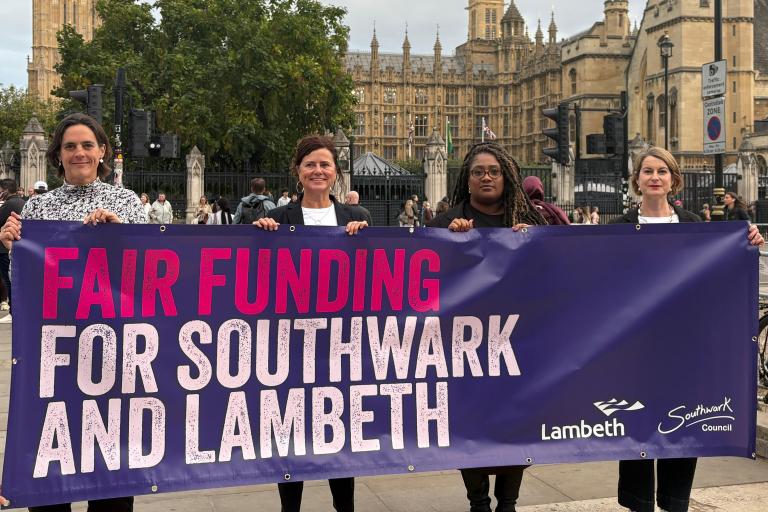 Leaders and MPs carry a fair funding banner