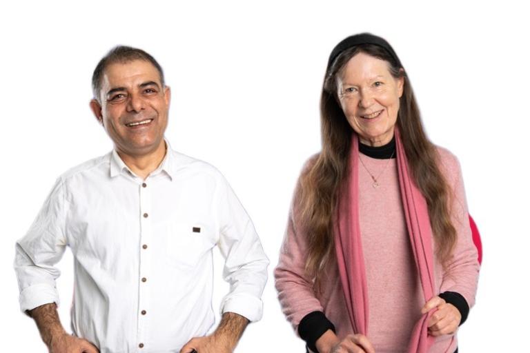 A man wearing a white shirt and a woman with long brown hair wearing a pink jumper