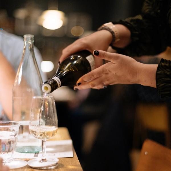 Image wine bottle being poured