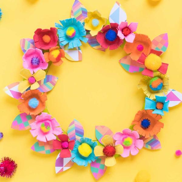 Yellow background with colourful flower wreath