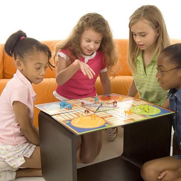 group of girls playing board games