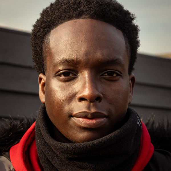 A close shot of that face of a young black male