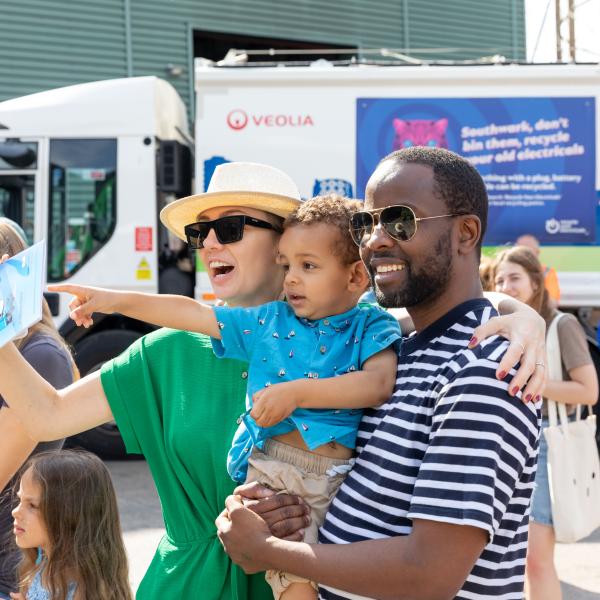 Family watching Veolia's big vehicle display show at Wonder Day 2024.