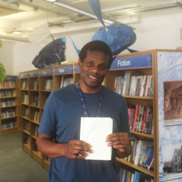 Man holding poem