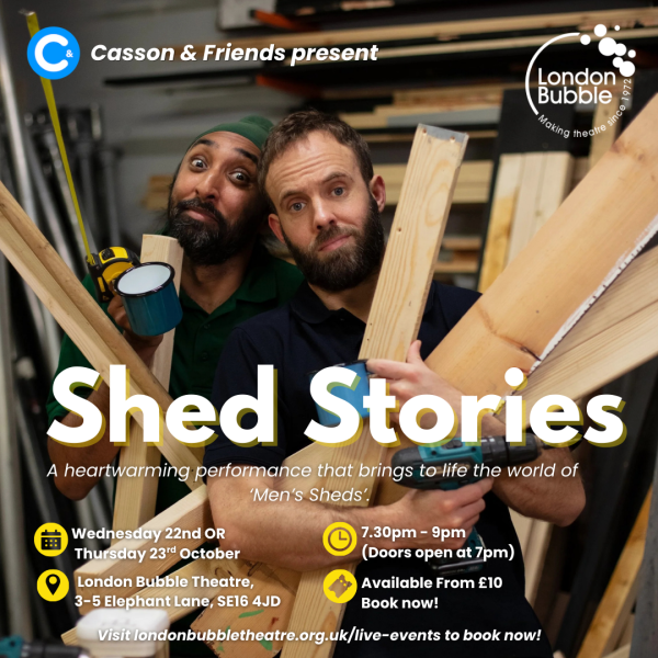 Two men hold stack of wood in their arms, as if to start a DIY project