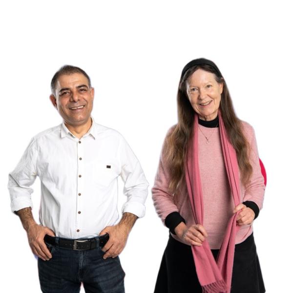 A man wearing a white shirt and a woman with long brown hair wearing a pink jumper